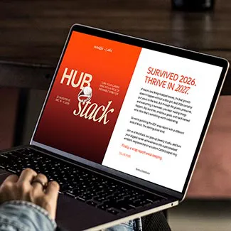 HubStack event website displayed on a laptop